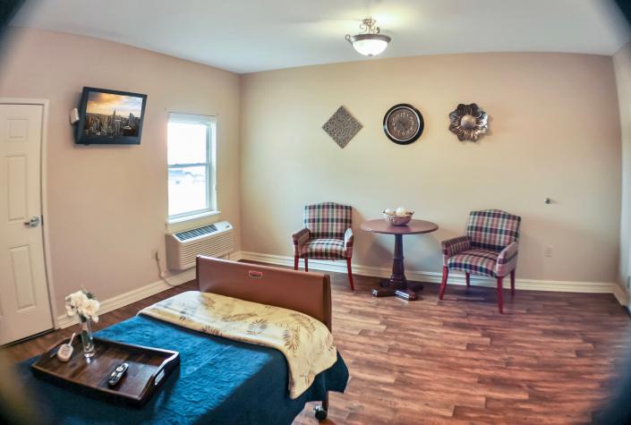 private room with sitting area at the highlands at owasso
